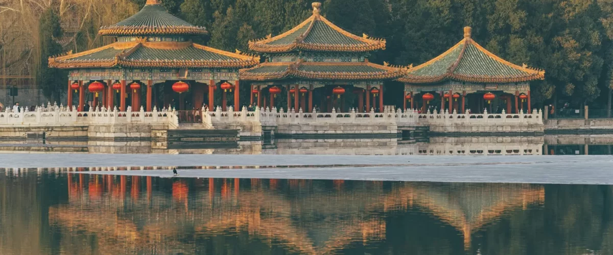 pexels-photo-6903499-6903499 Scenic view of traditional Chinese gazebo with reflection on a peaceful lake in Beijing, China.